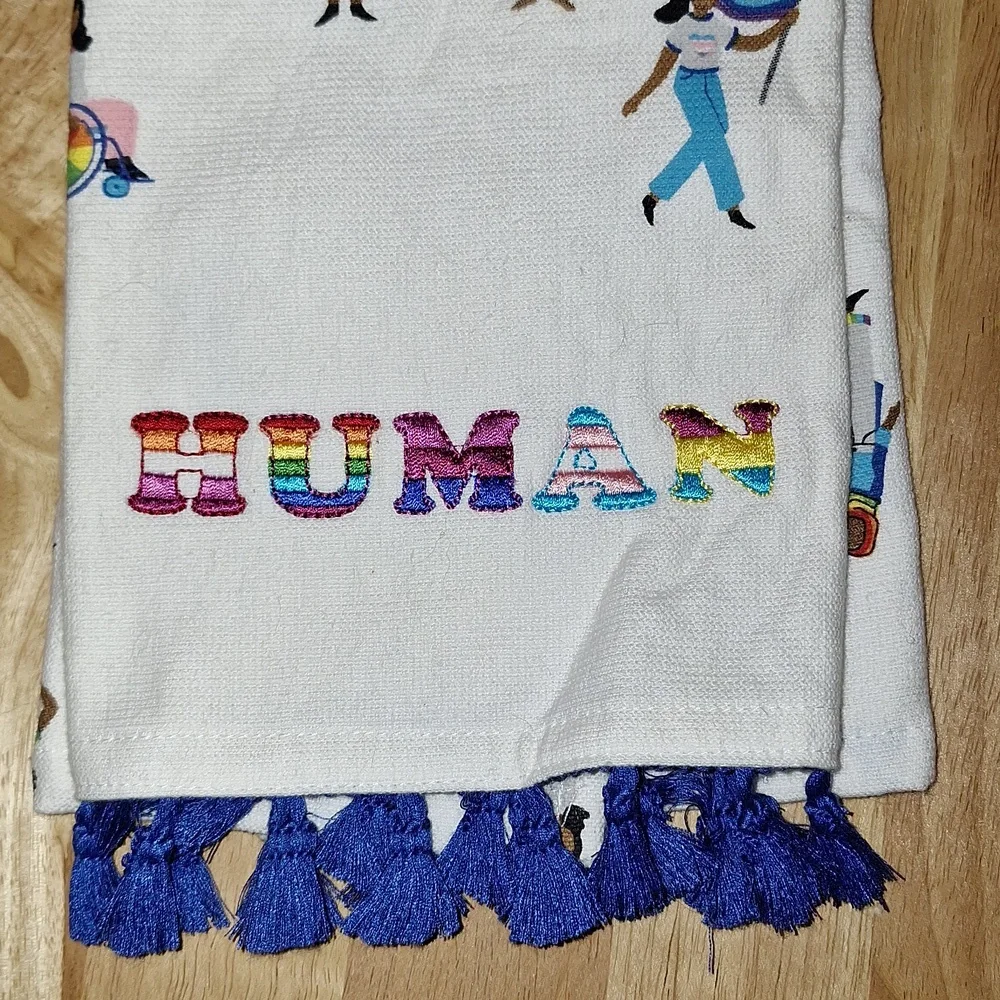 New Pride Human kitchen towel with blue tassel accents